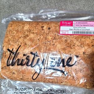 Thirty-one Tons of Funds in Tan Metallic Corkp